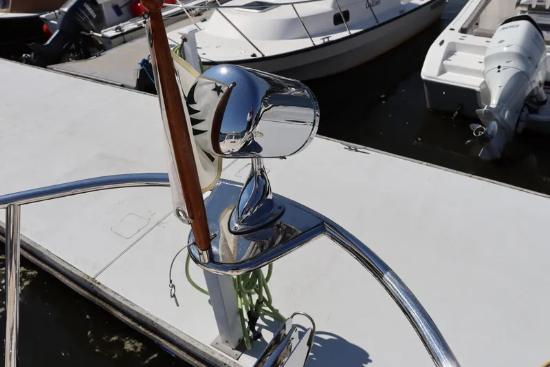Rambler VIII Yacht Photos Pics Chrome spotlight on 2013 MJM 36z Downeast boat at marina.