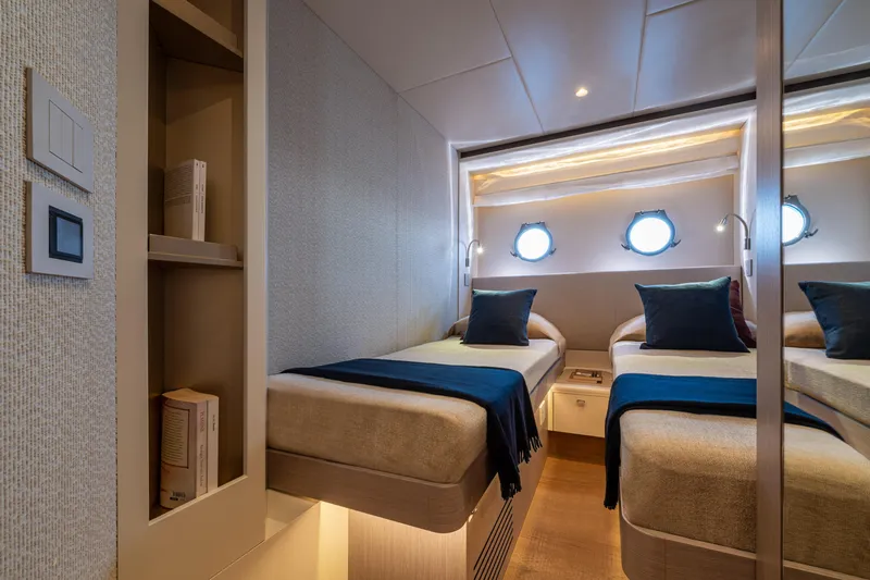  Yacht Photos Pics Luxurious twin cabin interior of 2026 Absolute Navetta 62 yacht with modern design.