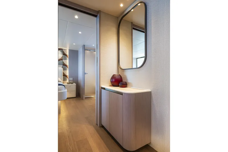  Yacht Photos Pics Luxurious interior of 2026 Absolute Navetta 62 yacht with modern decor and elegant furnishings.