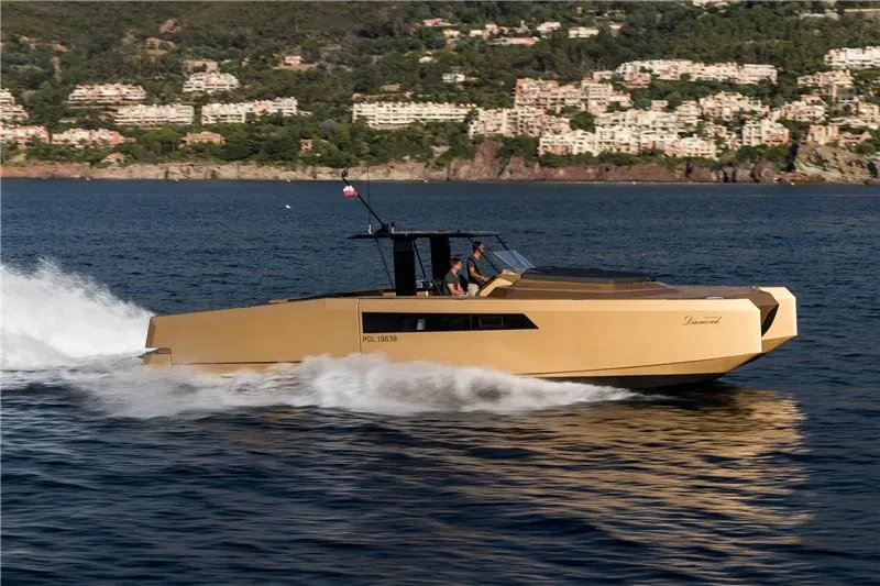 Diamond Yacht Photos Pics 2018 Sunreef 40 Open Sunreef Power Diamond yacht cruising on a scenic coastal waterway.