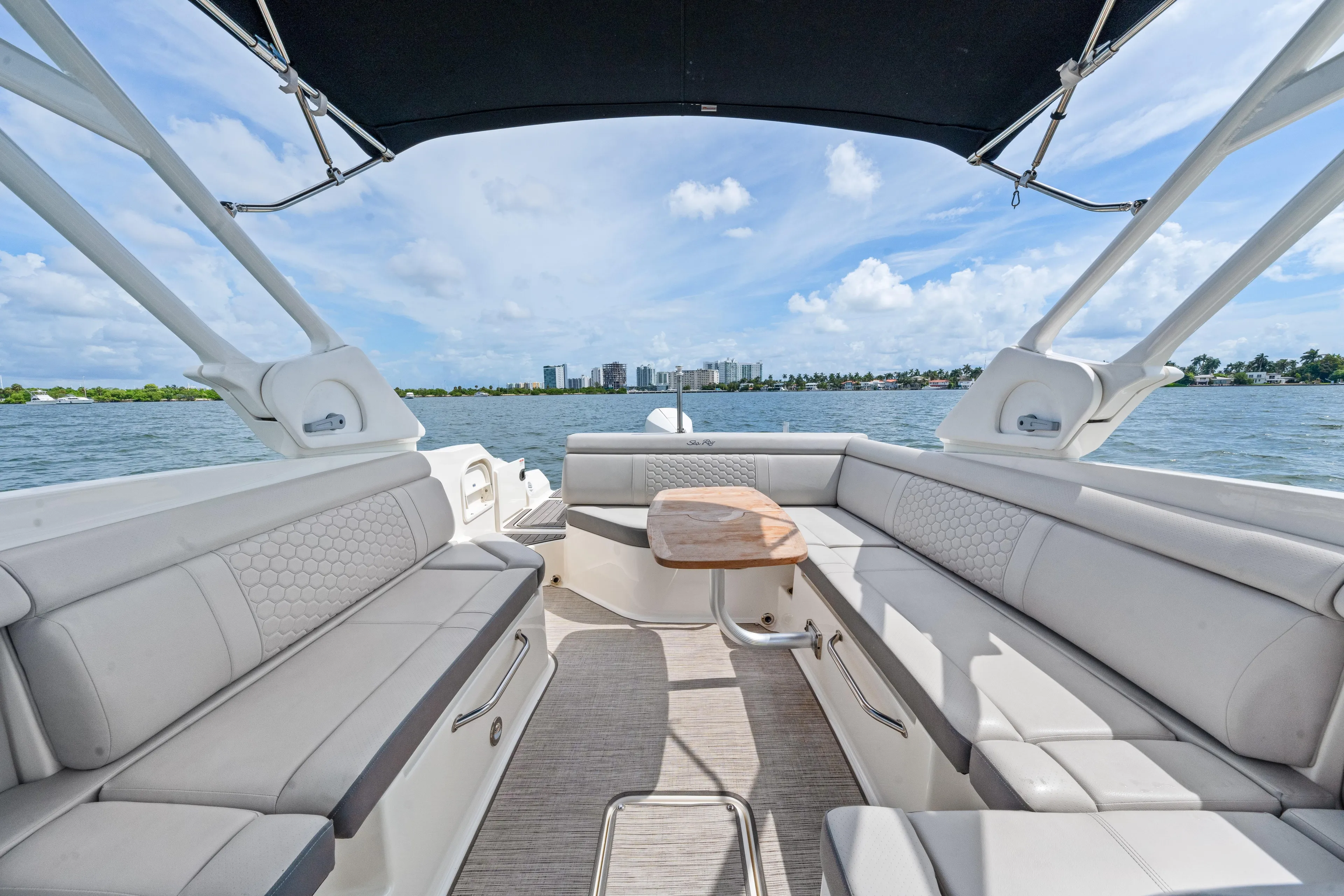  Yacht Photos Pics Luxurious 2023 Sea Ray SDX 270 Outboard boat interior with spacious seating and scenic water view.