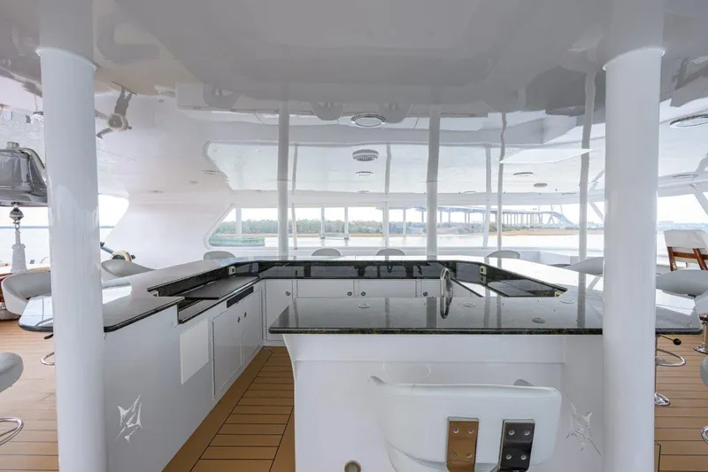 Compass Rose Yacht Photos Pics Luxurious 2011 C & G Boatworks Explorer yacht interior with sleek bar and seating area.