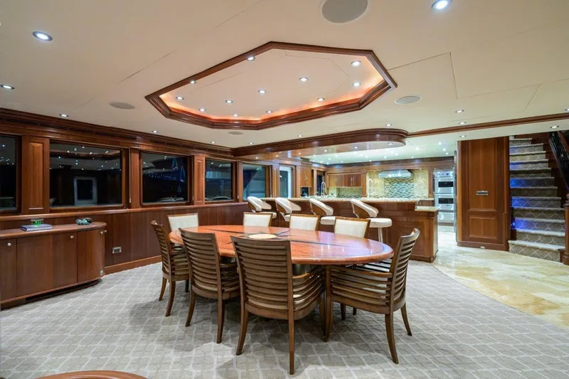 Compass Rose Yacht Photos Pics Luxurious interior of 2011 C & G Boatworks Explorer yacht with elegant dining area.