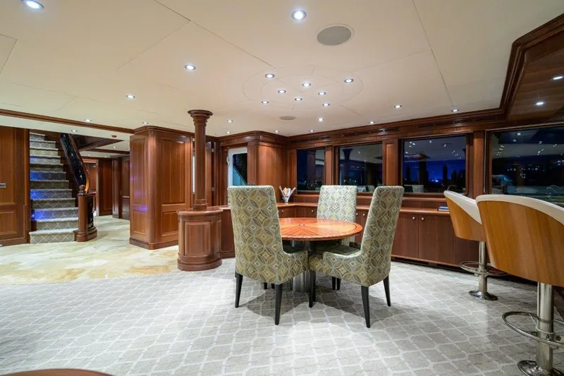 Compass Rose Yacht Photos Pics Luxurious interior of 2011 C & G Boatworks Explorer yacht with elegant dining area.