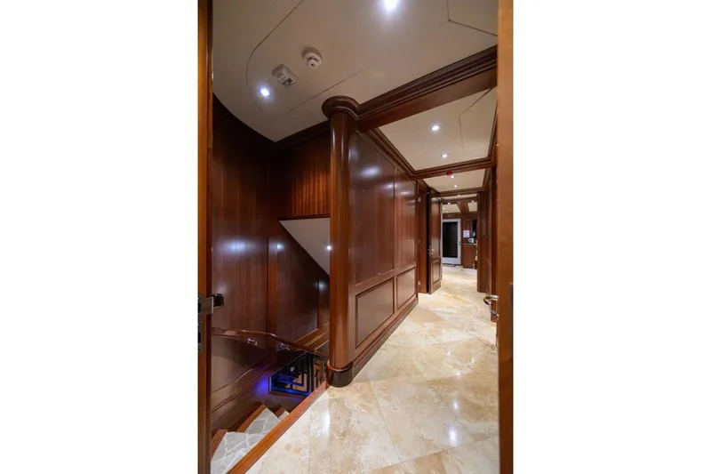 Compass Rose Yacht Photos Pics Luxurious interior of 2011 C & G Boatworks Explorer with polished wood and elegant lighting.