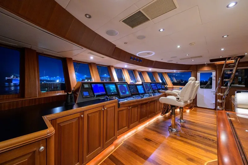 Compass Rose Yacht Photos Pics Luxurious 2011 C & G Boatworks Explorer yacht interior with wood paneling and advanced navigation systems.