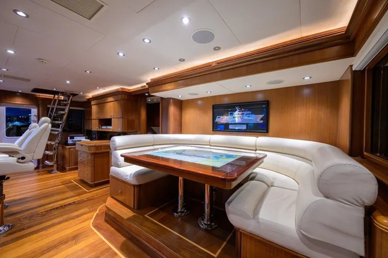 Compass Rose Yacht Photos Pics Luxurious 2011 C & G Boatworks Explorer yacht interior with elegant wood and leather seating.