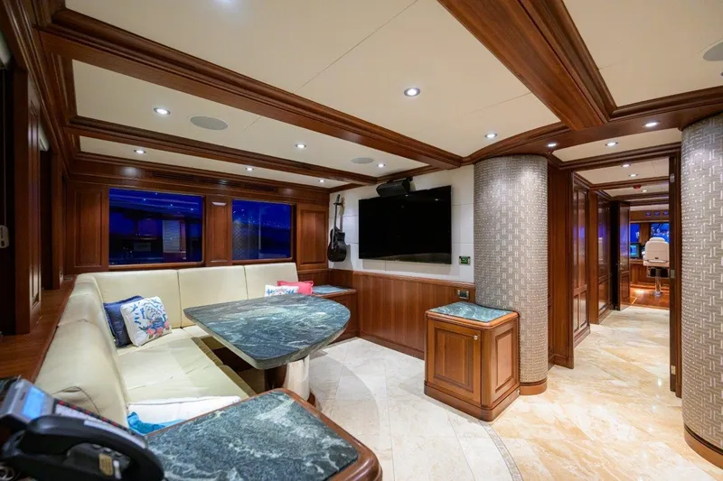 Compass Rose Yacht Photos Pics Luxurious interior of 2011 C & G Boatworks Explorer yacht with elegant wood finishes.