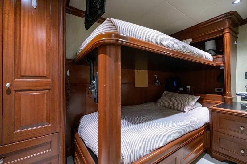 Compass Rose Yacht Photos Pics Luxurious wooden bunk beds in 2011 C & G Boatworks Explorer cabin.