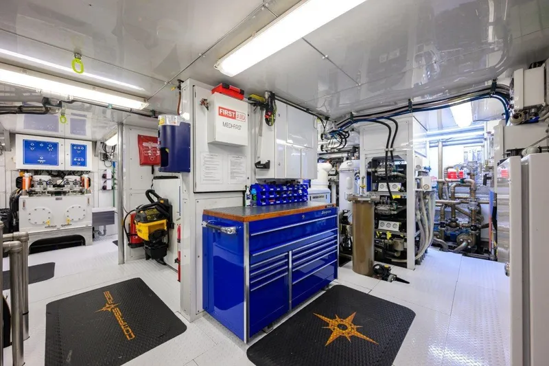 Compass Rose Yacht Photos Pics Engine room of 2011 C & G Boatworks Explorer, featuring equipment and storage.