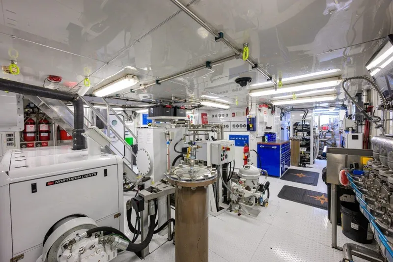 Compass Rose Yacht Photos Pics Engine room of 2011 C & G Boatworks Explorer, featuring advanced machinery and equipment.