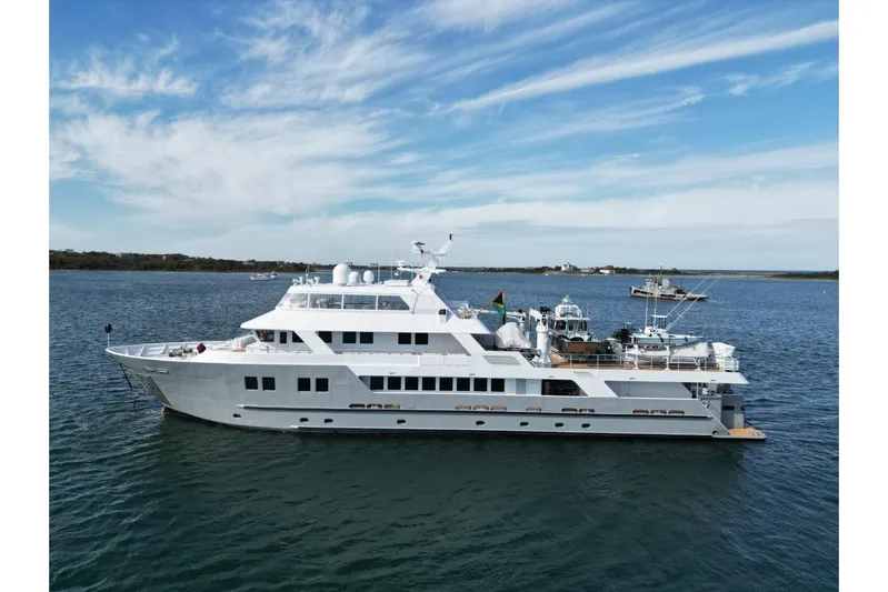 Compass Rose Yacht Photos Pics Luxurious 2011 C & G Boatworks Explorer yacht cruising on serene waters.