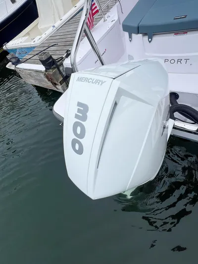 Girafft Yacht Photos Pics 2022 Axopar 28 Cabin with Mercury 300 outboard engine at dock.