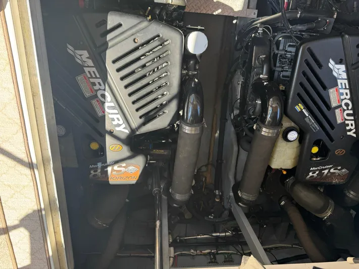 Yacht Photos Pics Engine compartment of a 2001 Sea Ray 380 Sundancer with Mercury MerCruiser 8.1S Horizon engines.