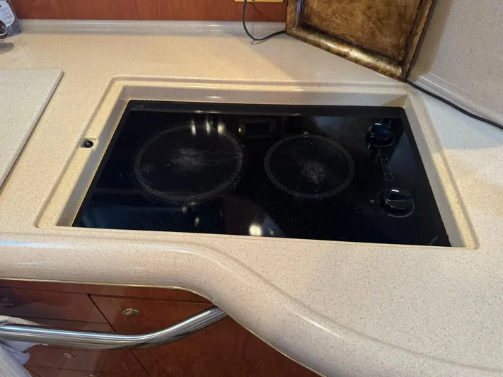  Yacht Photos Pics 2001 Sea Ray 380 Sundancer kitchen with built-in electric stovetop.