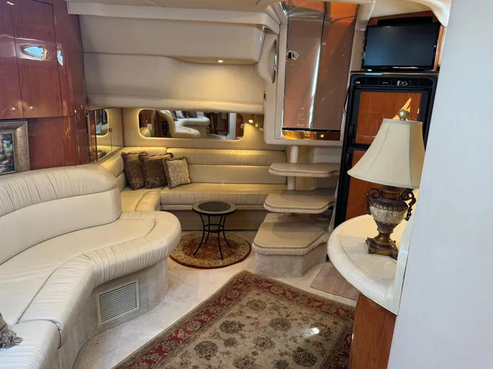  Yacht Photos Pics Luxurious interior of a 2001 Sea Ray 380 Sundancer yacht with elegant furnishings.