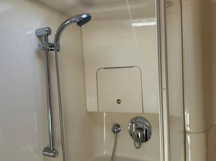  Yacht Photos Pics Shower area in 2001 Sea Ray 380 Sundancer yacht, featuring chrome fixtures.