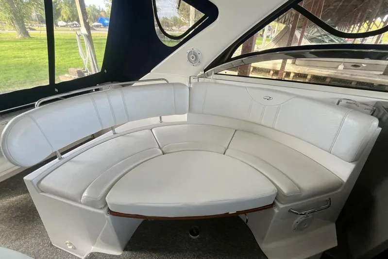  Yacht Photos Pics 2008 Regal Commodore 3760 IO boat interior with white curved seating.