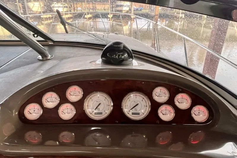  Yacht Photos Pics Dashboard of 2008 Regal Commodore 3760 IO boat with gauges and compass.