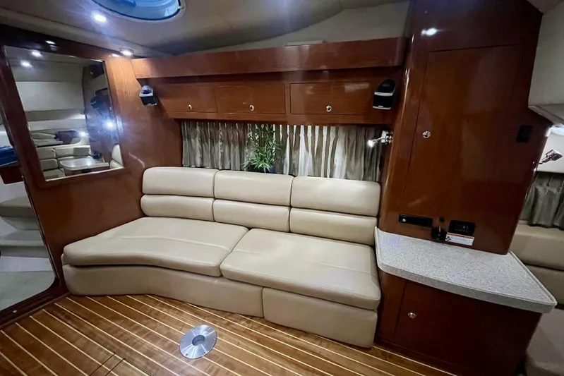  Yacht Photos Pics Luxurious interior of 2008 Regal Commodore 3760 IO yacht with leather seating and wood finish.