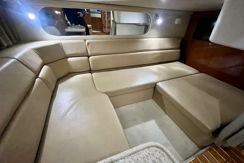  Yacht Photos Pics 2008 Regal Commodore 3760 IO interior with beige leather seating and ambient lighting.