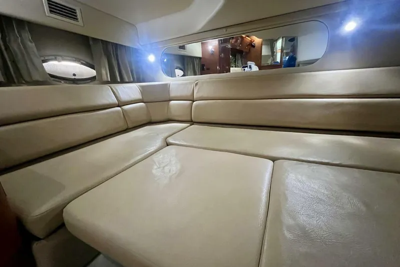  Yacht Photos Pics Luxurious interior of 2008 Regal Commodore 3760 IO yacht with beige leather seating.