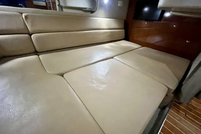  Yacht Photos Pics 2008 Regal Commodore 3760 IO interior with beige leather seating and wooden accents.