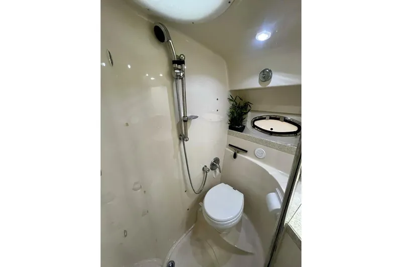  Yacht Photos Pics Bathroom interior of 2008 Regal Commodore 3760 IO yacht with shower and toilet.