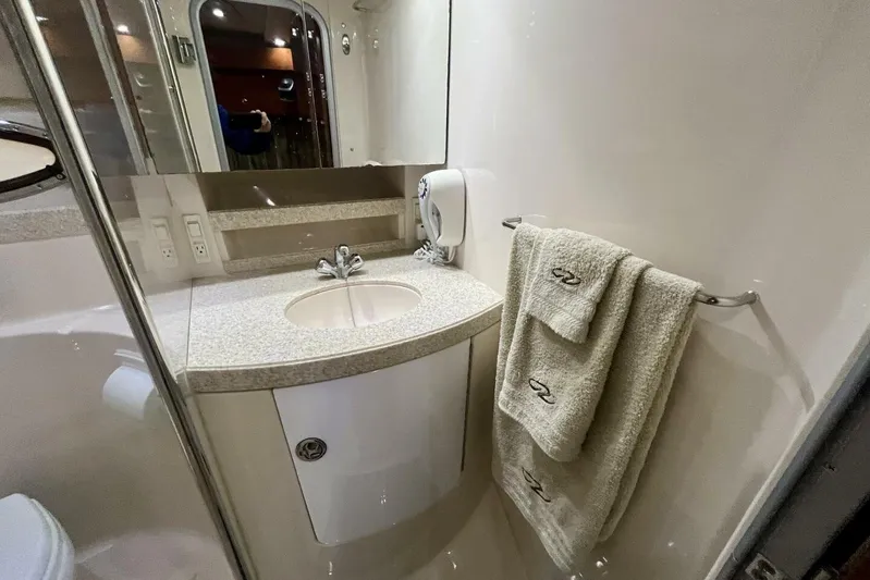  Yacht Photos Pics Luxurious bathroom in 2008 Regal Commodore 3760 IO yacht with modern fixtures.