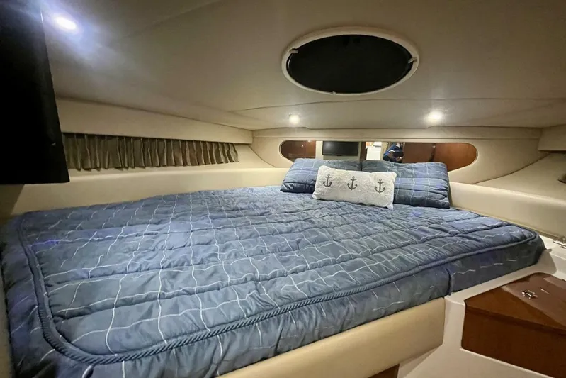 Yacht Photos Pics Interior cabin of 2008 Regal Commodore 3760 IO with cozy bed and nautical decor.