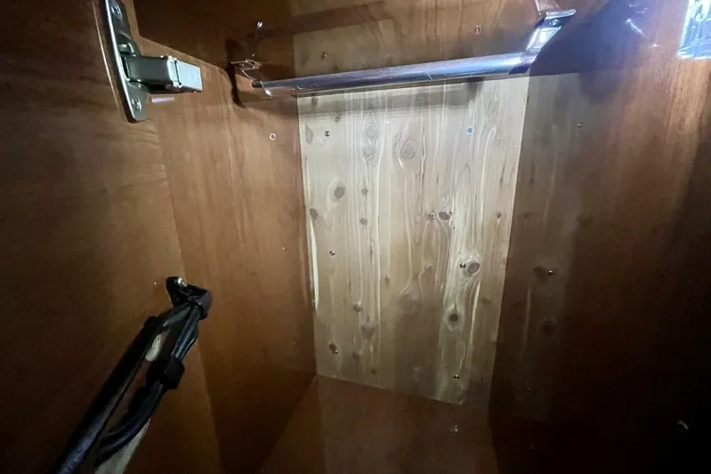  Yacht Photos Pics Interior view of 2008 Regal Commodore 3760 IO wooden storage compartment.