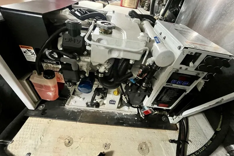  Yacht Photos Pics Engine compartment of 2008 Regal Commodore 3760 IO boat, featuring Kohler generator.