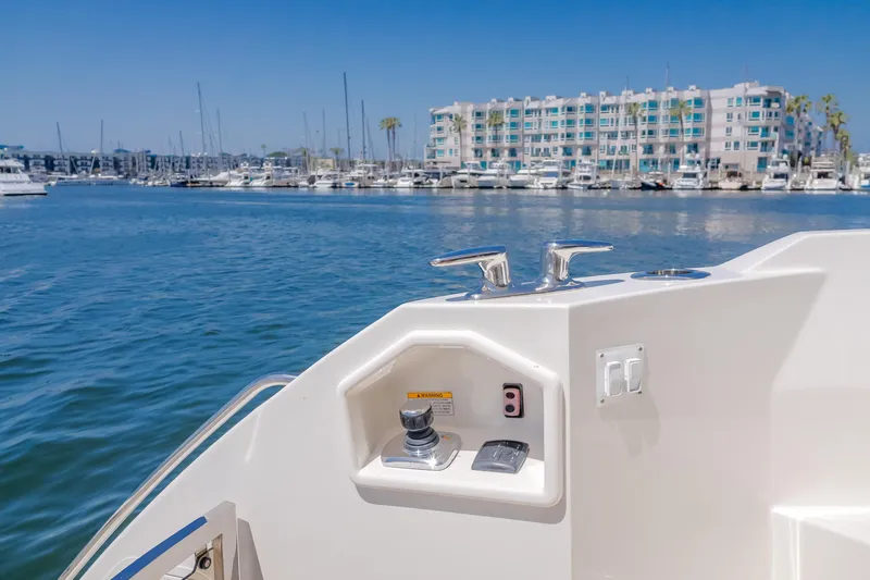 No Regrets Yacht Photos Pics 2016 Sea Ray L590 yacht with marina view and modern controls.