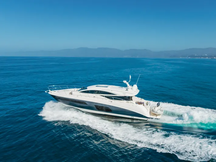 No Regrets Yacht Photos Pics 2016 Sea Ray L590 yacht cruising on open blue ocean waters.