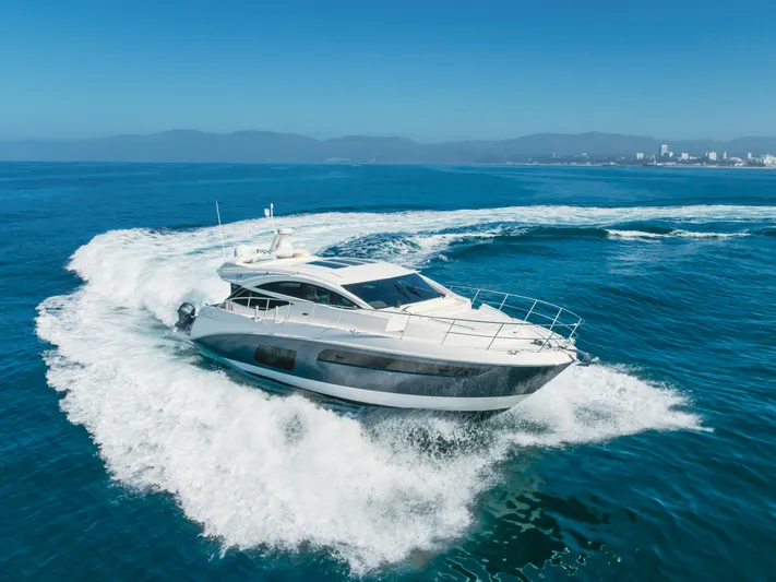 No Regrets Yacht Photos Pics 2016 Sea Ray L590 yacht cruising on open blue ocean waters.