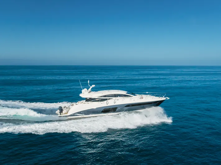 No Regrets Yacht Photos Pics 2016 Sea Ray L590 yacht cruising on open blue ocean waters.