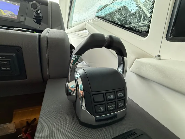  Yacht Photos Pics Control panel of 2018 Cruisers Yachts 42 Cantius with throttle and navigation display.