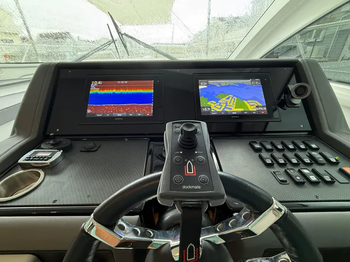  Yacht Photos Pics Helm of 2018 Cruisers Yachts 42 Cantius with navigation screens and controls.