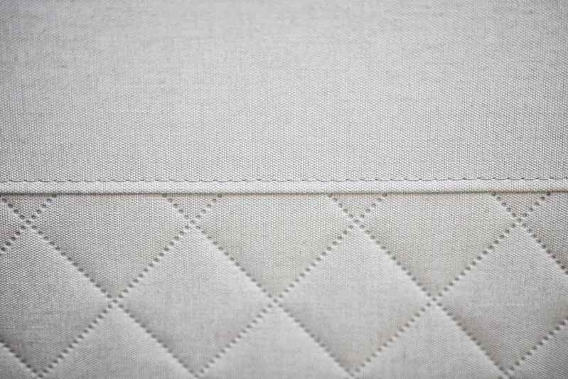  Yacht Photos Pics Quilted fabric detail of 2024 Skamander Sorrento interior upholstery.