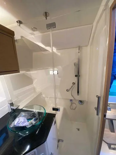  Yacht Photos Pics 2024 Skamander Sorrento bathroom with modern glass sink and shower.