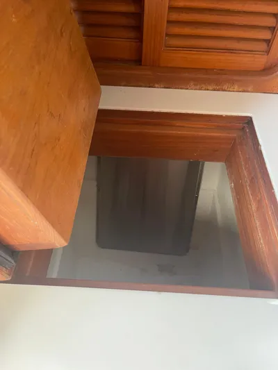 Emerald Yacht Photos Pics Wooden hatch opening on Passport 47 AC Plan B, 1995 model.