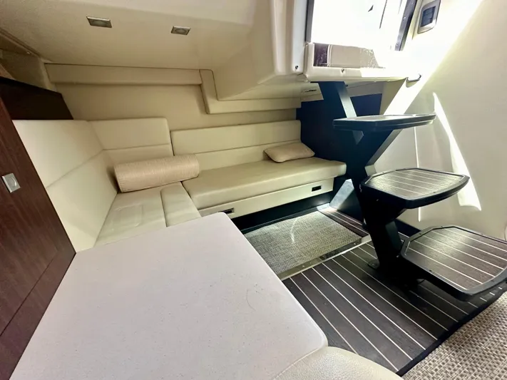 Magic Ten Yacht Photos Pics Interior of 2015 Monterey 335 Sport Yacht with modern seating and sleek design.