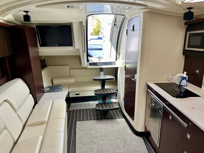 Magic Ten Yacht Photos Pics 2015 Monterey 335 Sport Yacht interior with modern amenities and sleek design.