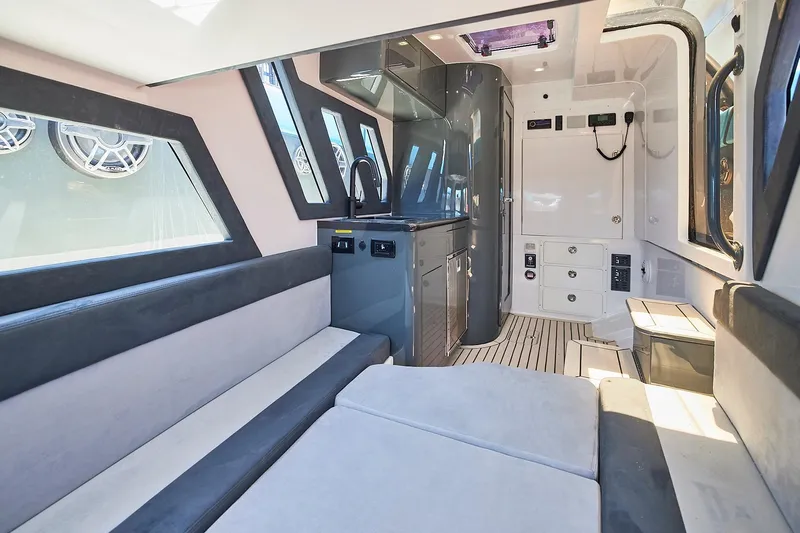  Yacht Photos Pics Luxurious interior of 2022 Midnight Express 43' Solstice yacht with modern amenities.