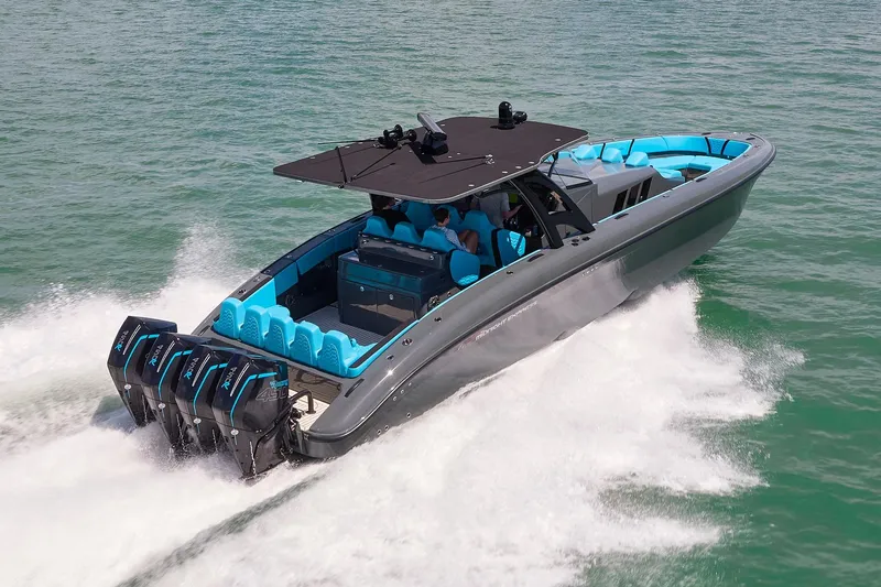  Yacht Photos Pics 2022 Midnight Express 43' Solstice boat cruising on open water, featuring sleek design and powerful engines.