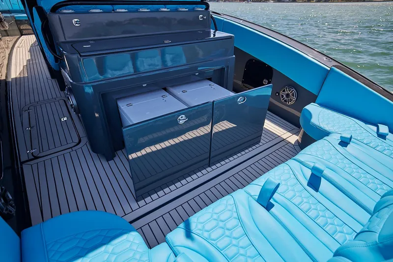  Yacht Photos Pics Luxurious interior of 2022 Midnight Express 43' Solstice boat with blue seating and sleek design.