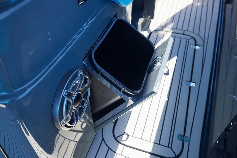  Yacht Photos Pics Open storage compartment on 2022 Midnight Express 43' Solstice boat deck.