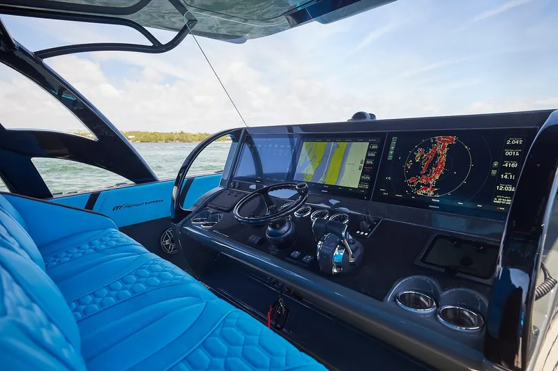  Yacht Photos Pics Luxurious 2022 Midnight Express 43' Solstice yacht cockpit with advanced navigation displays.
