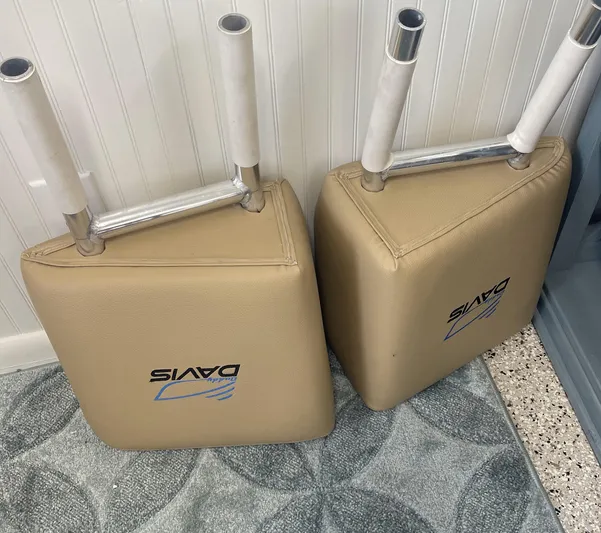  Yacht Photos Pics Cushioned boat seats from a 2018 Buddy Davis 28 Center Console, leaning against a wall.
