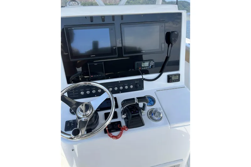  Yacht Photos Pics 2018 Buddy Davis 28 Center Console helm with dual screens and controls.